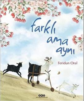 Feridun Oral’ın Farklı ama Aynı isimli kitabının kapağı. Vücuduna takılı yürüteçle çimlerden aşağı koşan beyaz bir keçi, arkasında küçük siyah ve önünde küçük beyaz bir oğlak da onunla beraber koşuyor. Yukarıda mavi beyaz gökyüzü ve ağaçların pembe kırmızı çiçekleriyle yaprakları görülüyor.