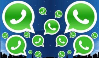 Görselde küçük büyük farklı boyutlarda ve çok sayıda yeşil whatsapp simgesi yer alıyor.